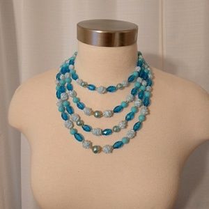 True vintage 4 strand blue beads necklace.